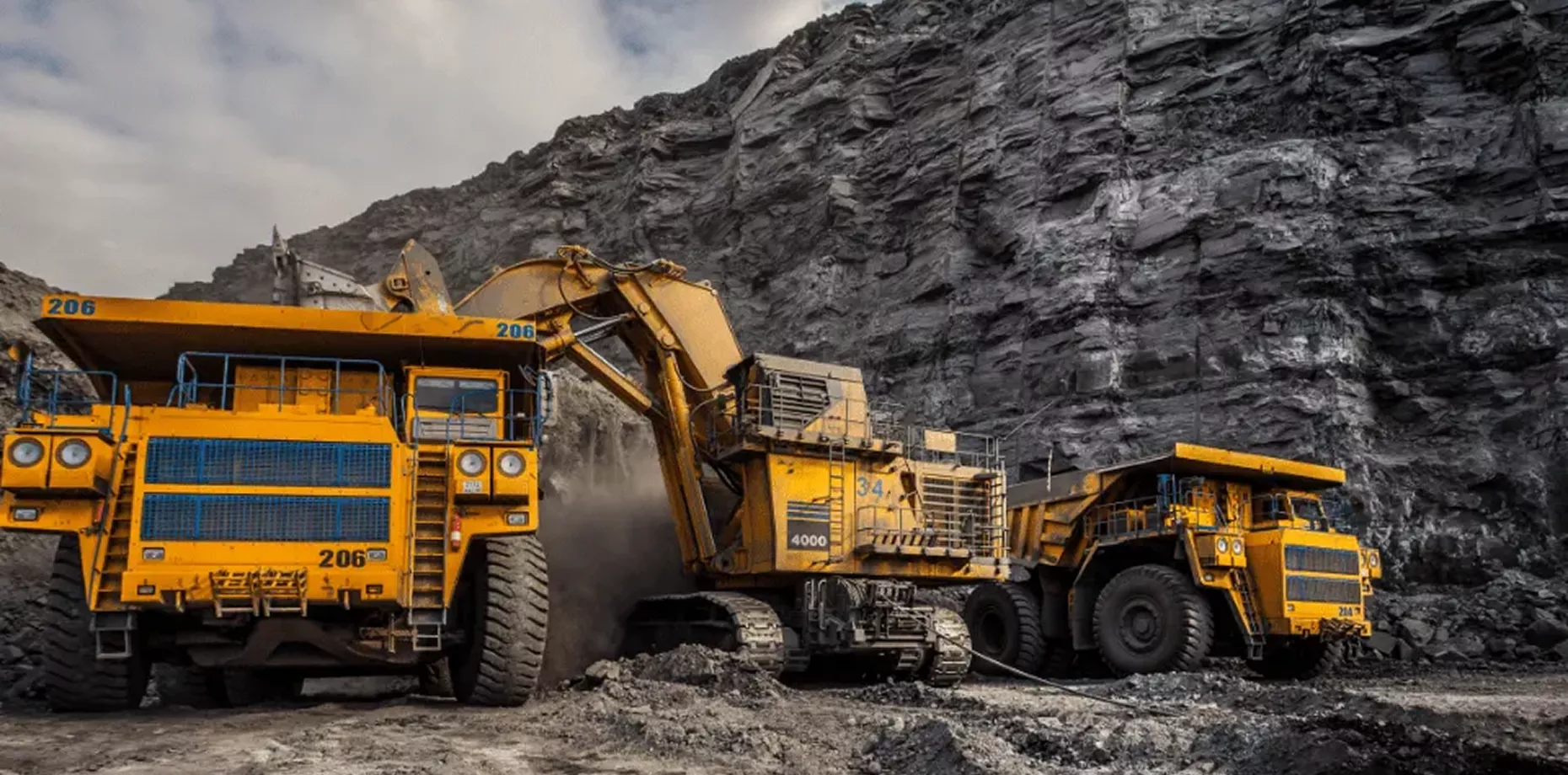 Hydraulic mining machinery operating in an open pit mine